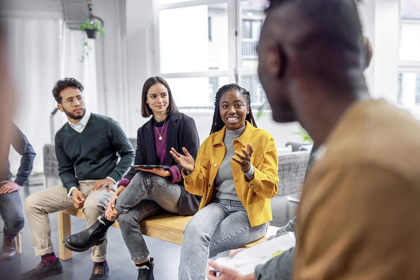 a group of people working together slack channel remote team in person thanksgiving twist celebrate thanksgiving teams fun play games virtual thanksgiving
