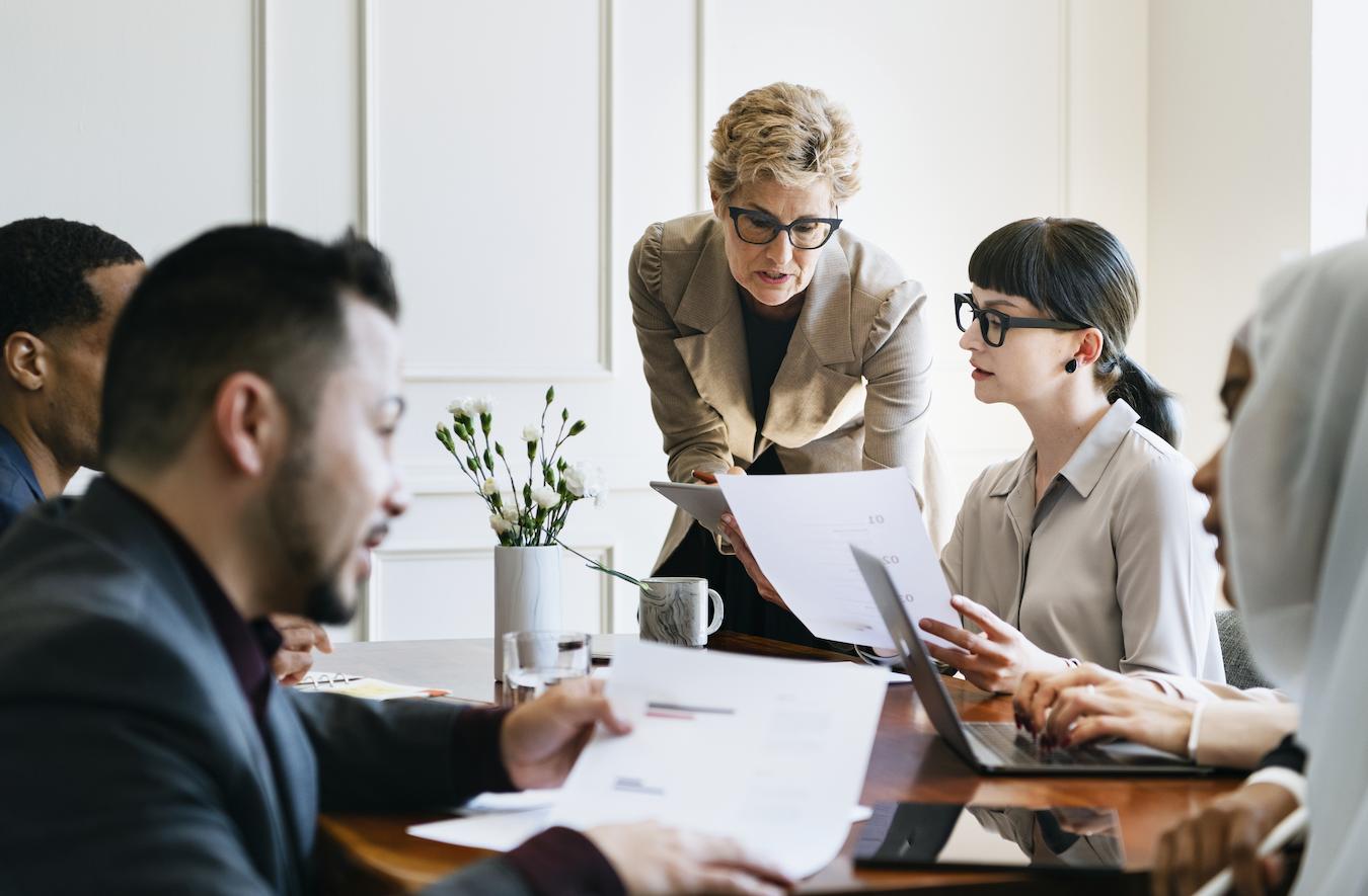 Five employees use company resources to create document explaining the importance of company policy