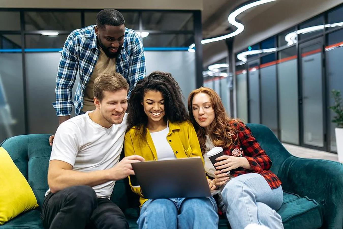 people sitting on a couch laughing together holistic hospitality solutions hospitality industry insights driven approach owners spaces companies hotels recent years owners service food space service